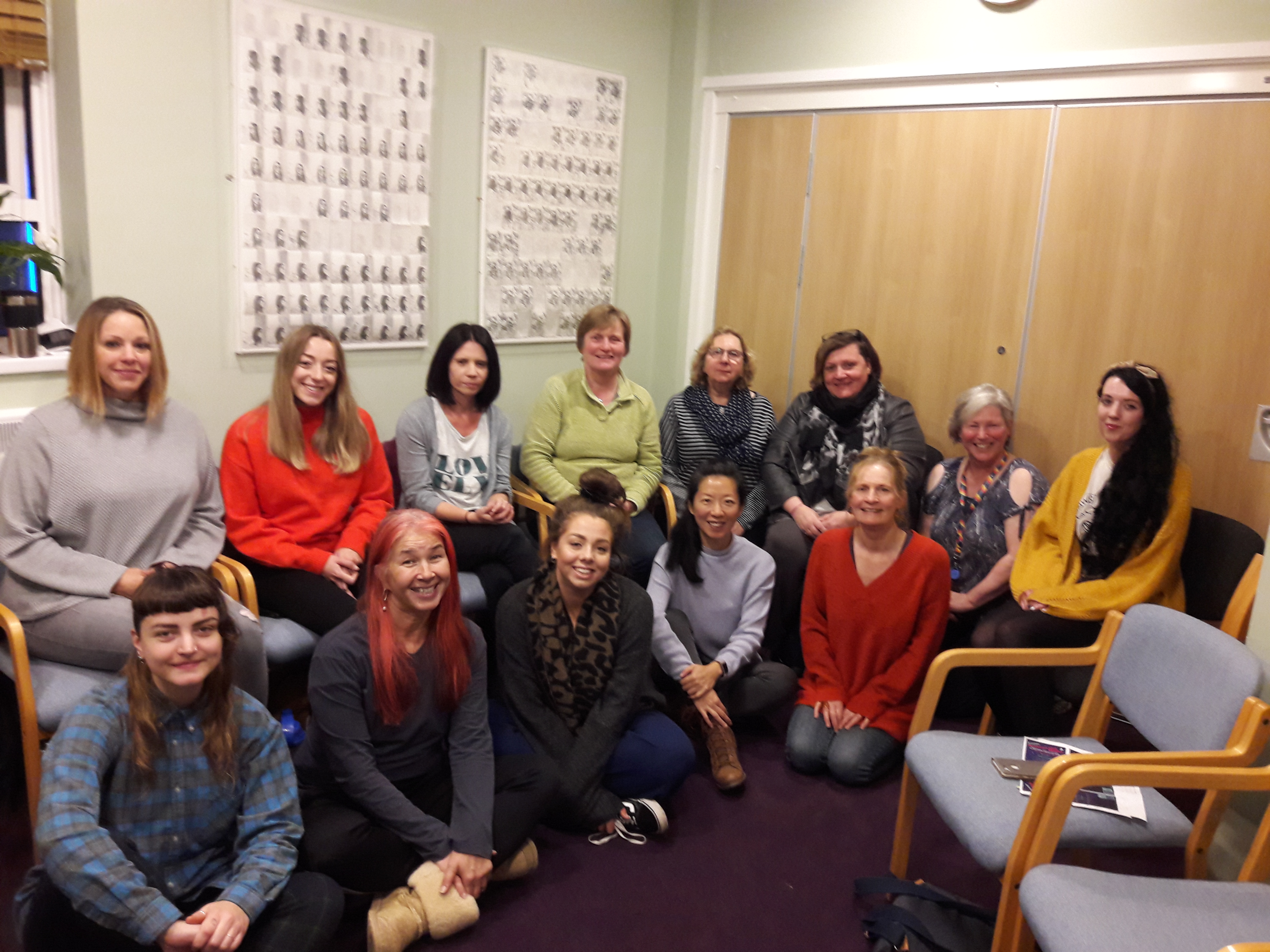 DRCSAS volunteer team group photo - 13 smiling women